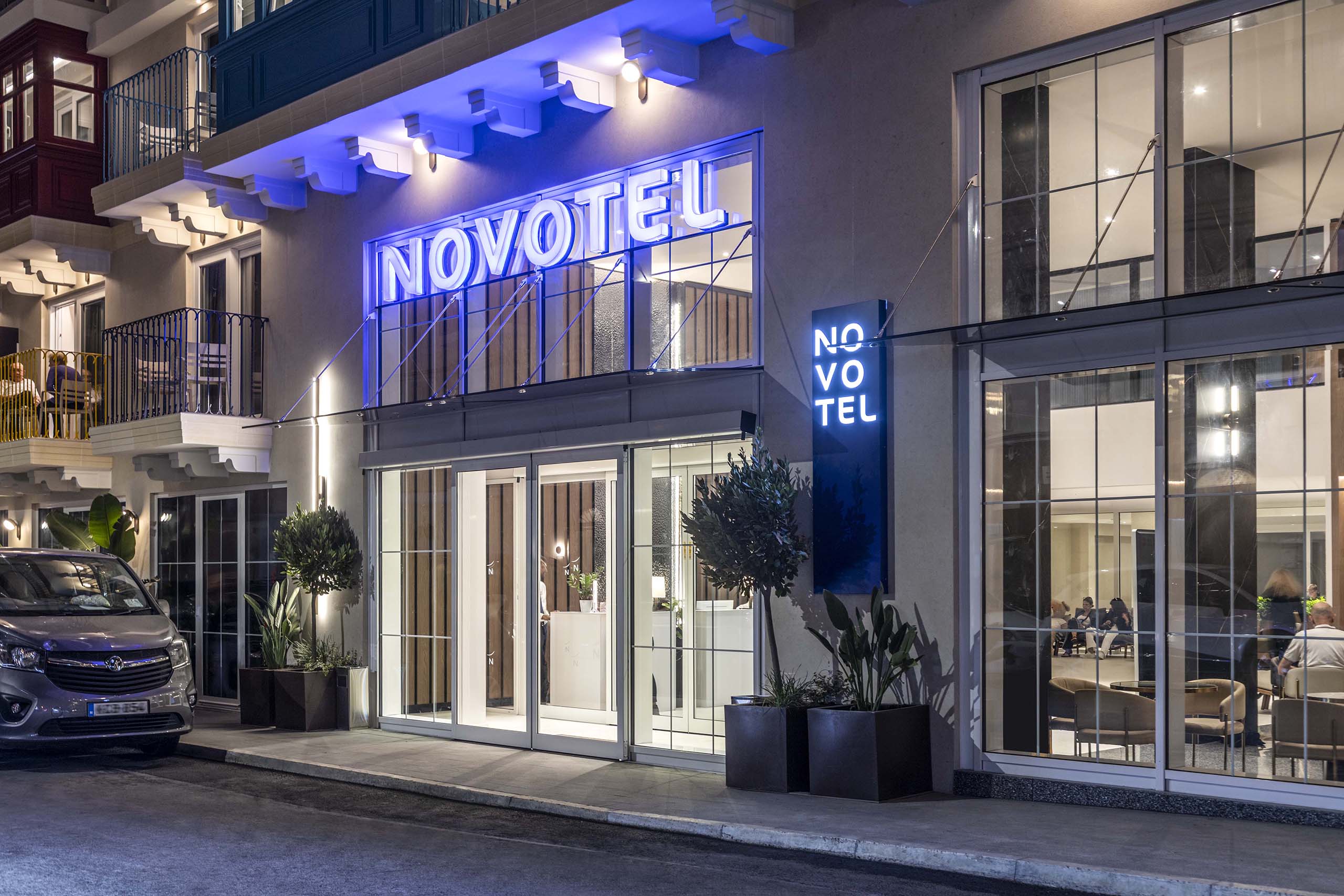 Novotel Malta Sliema entrance with illuminated signage